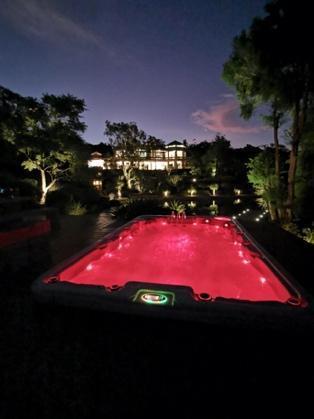 Resort Style Spa Installation with Waterfall & LED Lighting Features